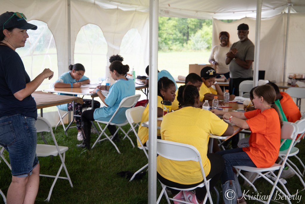 Kids decorate horse silks