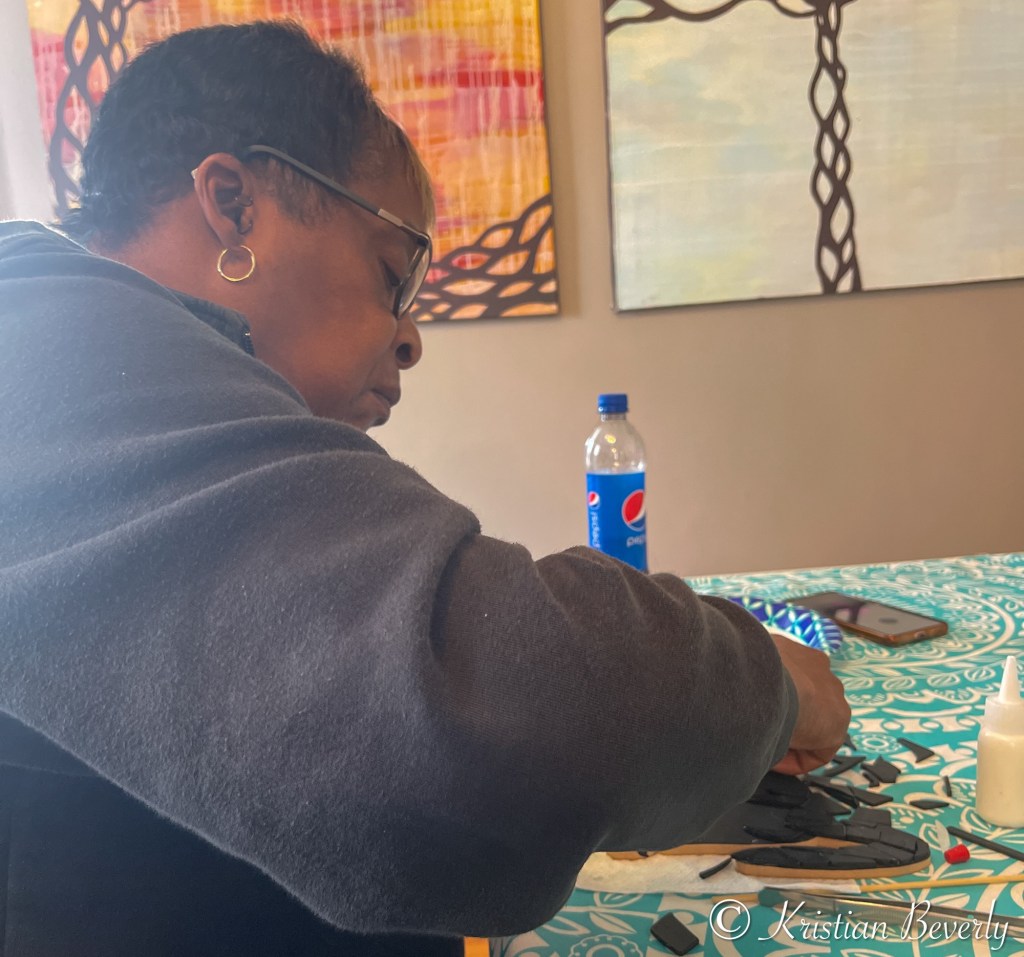 Paulette Beverly working on her ceramic class