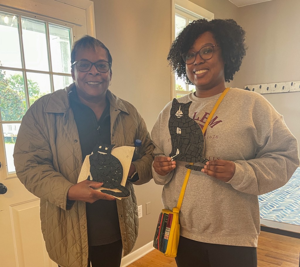 Kristian Beverly and Paulette Beverly with their finished art